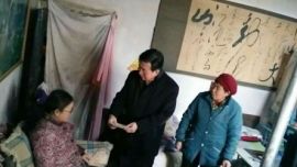 董建镇深入南街辖区走访慰问贫困残疾人