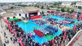 罗山川乡举办第四届农民运动会暨物资交流大会