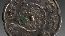 尋寶博物館丨唐葵花形纏枝紋銅鏡