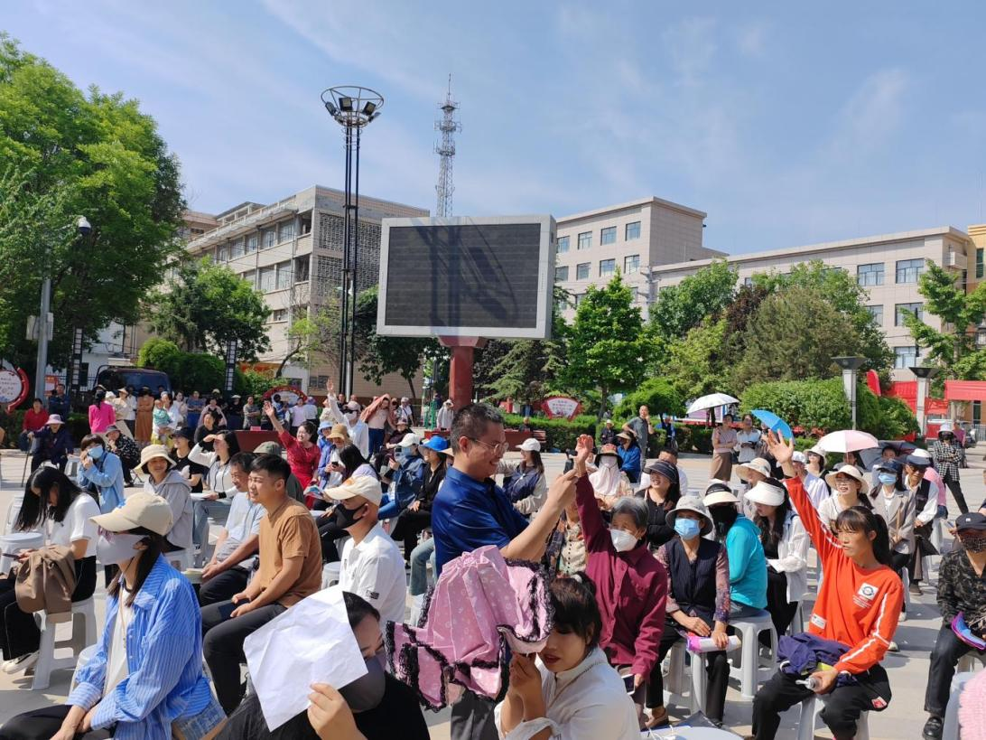 庆阳市举办“巾帼普法乡村行”示范活动现场图