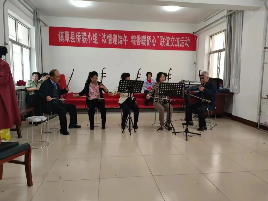镇原县侨联小组开展“浓情迎端午 粽香暖侨心”联谊交流活动