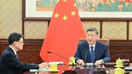 習(xí)近平聽取李家超述職報(bào)告