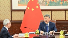 習(xí)近平聽取岑浩輝述職報(bào)告